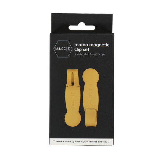 Maggie magnetic clip set in its original black cardboard packaging, featuring two gold-colored clips on a clean white background.