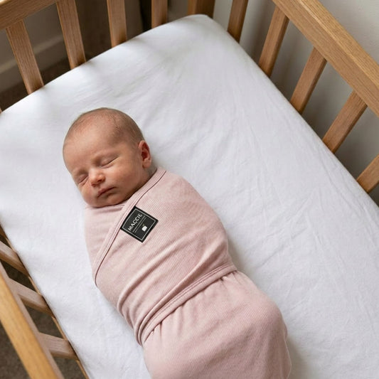 tuck + cuddle newborn stretchy swaddle wrap l misty pink ribbed bamboo