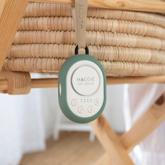 hush and glow pod hanging from bassinet