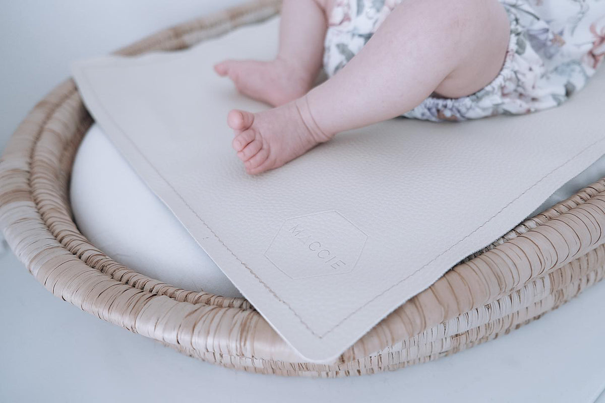 tan baby changing mat