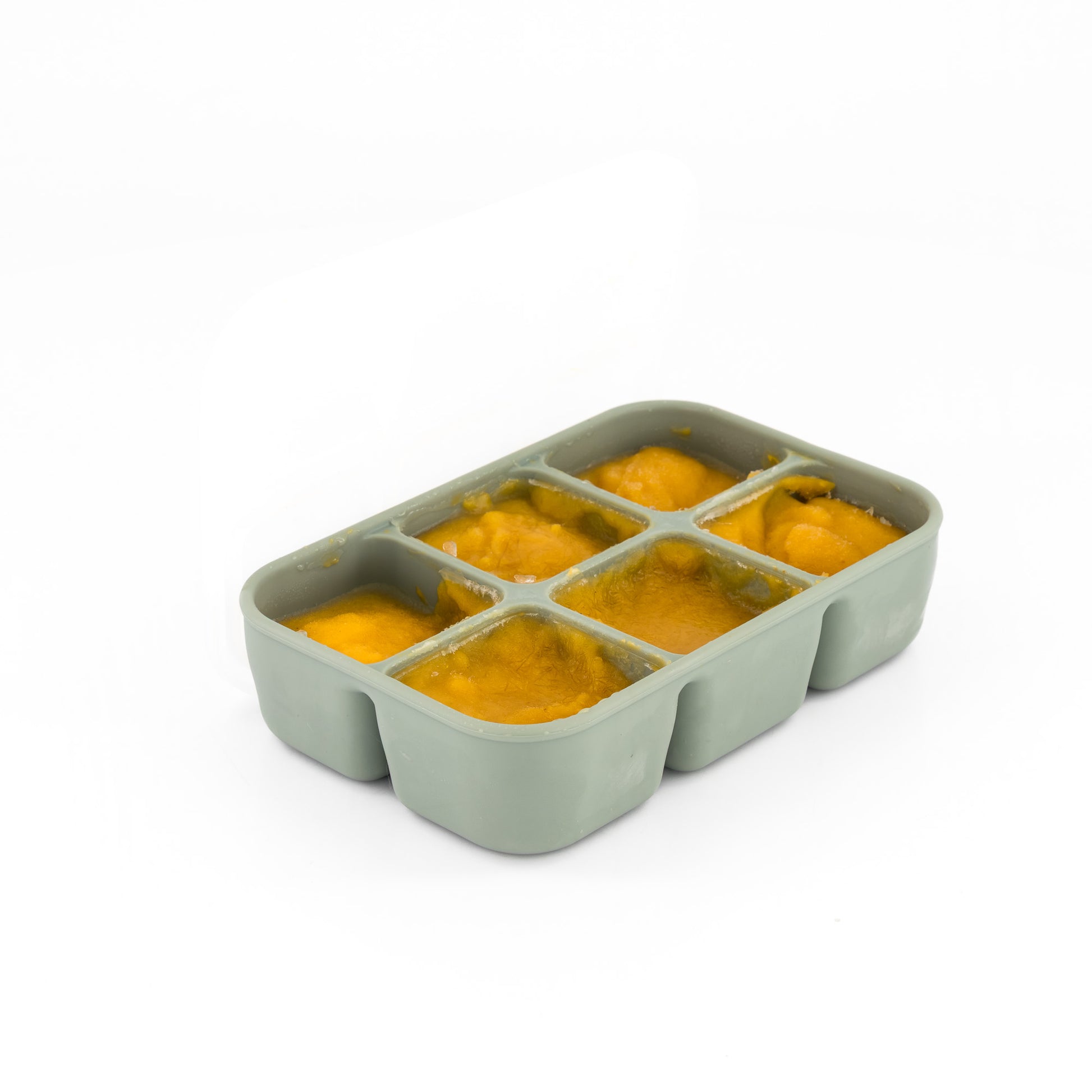 Close-up of MACCIE silicone tray used in the freezer to hold and freeze homemade baby purees or breast milk portions for weaning.