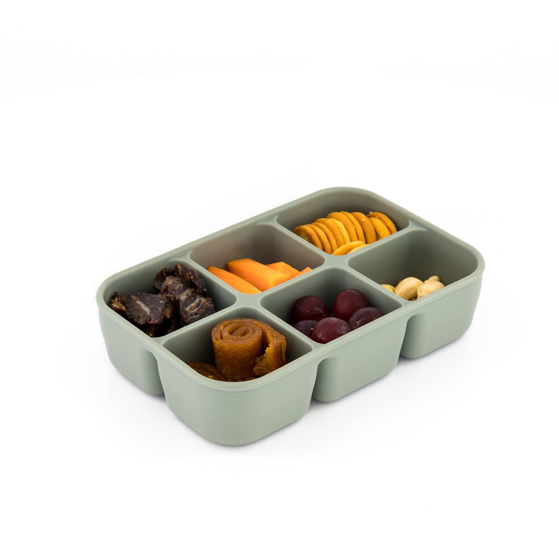 Toddler or child holding the small, square MACCIE cube snack box filled with healthy snacks like berries, cheese, and crackers, suitable for car or travel